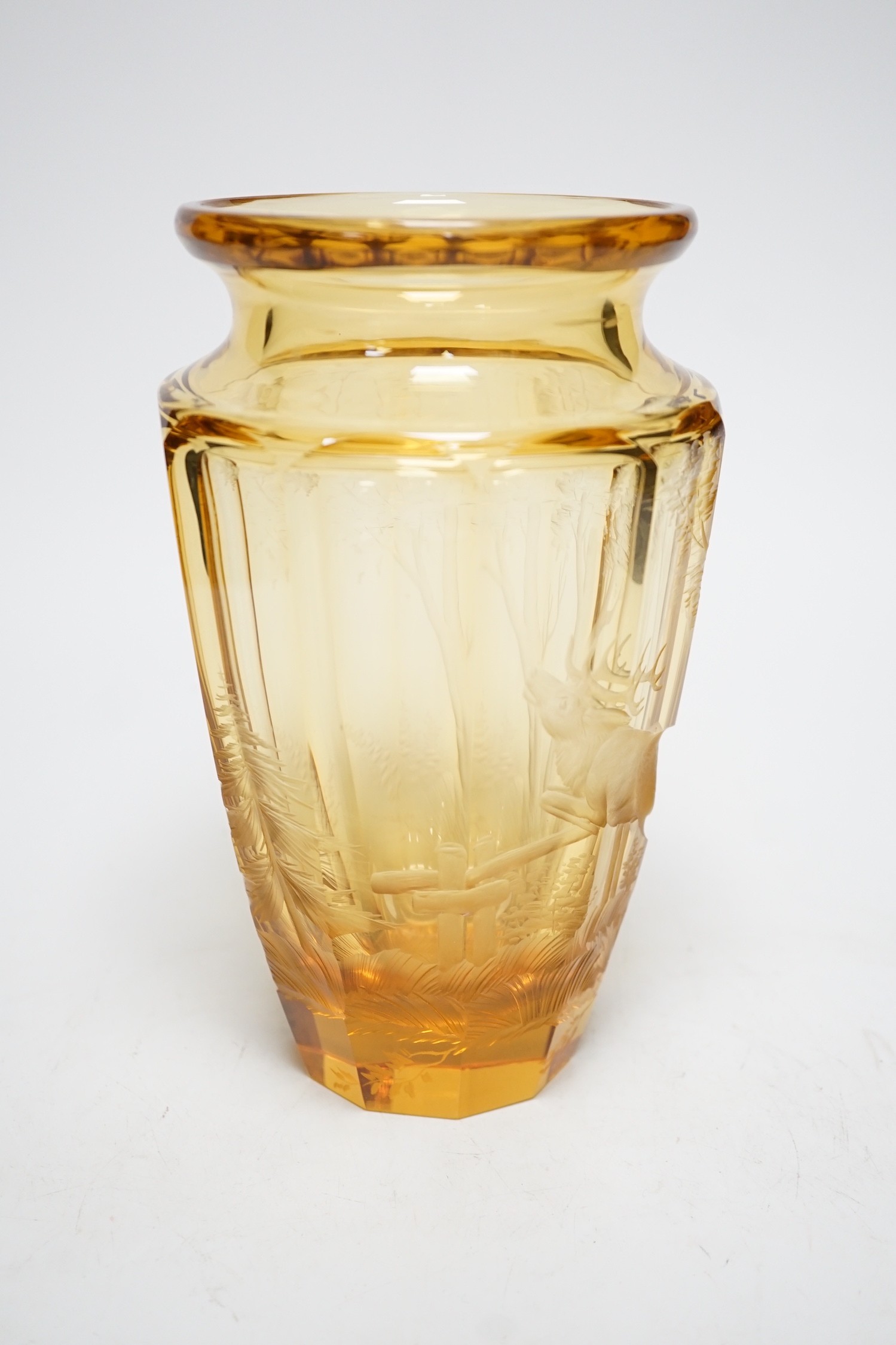 A Moser wheel engraved amber glass vase, 22cm